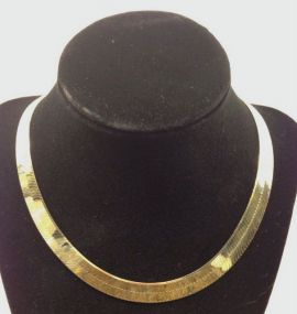 One stamped 10KT yellow gold lady's cast 11mm wide and 16" long Herringbone Necklace