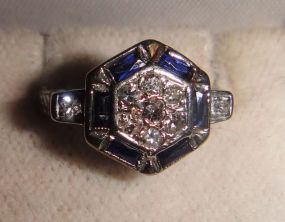 One stamped 18KT white gold lady's cast diamond and sapphire antique ring