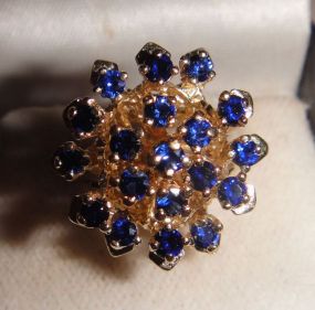 One stamped 14KT yellow gold lady's cast sapphire cluster ring