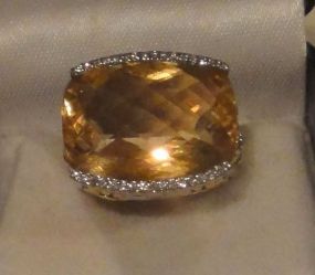 One stamped 14KT white and yellow lady's cast citrine and diamond ring