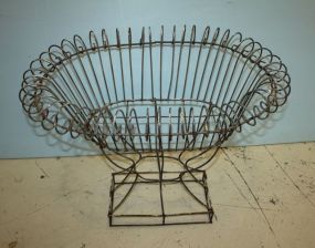 Oval Wrought Iron Planter 28" l., 22" h., 20" w.