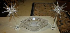 Oval Cut Glass Bowl and Two Glass Candleholders Bowl 11 1/2" l., 7" w.; candleholders 12"h.