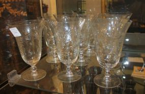 Set of Nine Etched Glasses one chipped, 6"h.