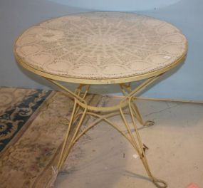 Painted Yellow Metal Table Matches lot #423; 35"dia., 29"h.