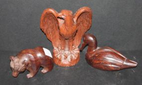 Carved Rosewood Bear, Rosewood Carved Duck, and Resin Eagle Carved Rosewood Bear 4"w., Rosewood Carved Duck, and Resin Eagle 7"w.
