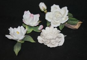 Four Porcelain Flowers 3", one needs glue
