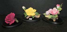Group of Three Porcelain Roses on Stands Beautiful yellow, pink, red roses; 6" w.