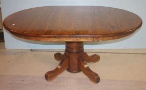 Oval Oak Table 65" Long, 47" across, 29"h.