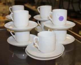 Nine Demi Tesse Cups and Saucers Nine Demi Tesse Cups and Saucers