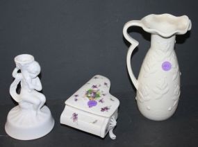 Porcelain Piano Box, Cupid Candlestick, and Ewer Porcelain Piano Box, Cupid Candlestick 5"h., and Ewer 6"h.