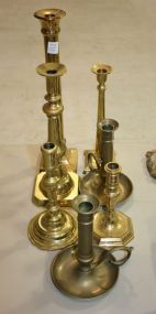 Group of Seven Brass Candlesticks 8"-15"h.