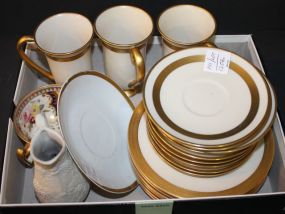 Flintridge Saucers, three small mugs, 8 Lenox bread and butters, cup and saucer, parion 4" pitcher Flintridge Saucers, three small mugs, 8 Lenox bread and butters, cup and saucer, parion 4" pitcher