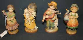 Group of Four Wood Carved Anri Figurines 6"h