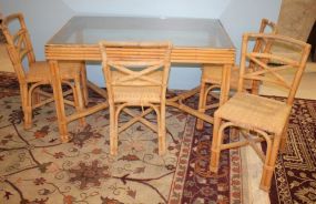 Bamboo Table and 4 Matching Chairs Table has glass top, 49"w, 31"d., 30"h.