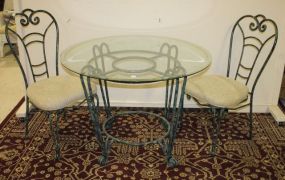 3 pc. Iron and Glass Table Set Black and green painted table and 2 chairs, 42"d., 30"h.