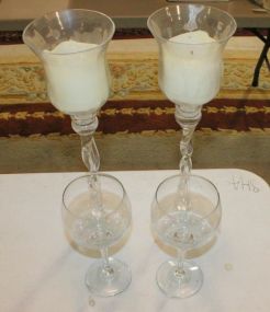 Two Barely Twist Glass Candleholders and Two Glasses Two Barely Twist Glass Candleholders 15"h., and Two Glasses.