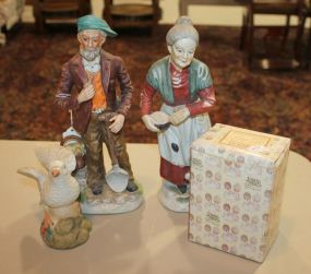 Pair of Painted Ceramic Figurines of Peasants, and Precious Moments Figurine Pair of Painted Ceramic Figurines of Peasants 11"h., and Precious Moments Figurine 5"h., Dove.