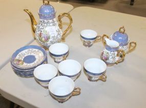 Small Japan Lusterware Tea Set Teapot, creamer, sugar, 6 cups and saucers, teapot, 7"h.