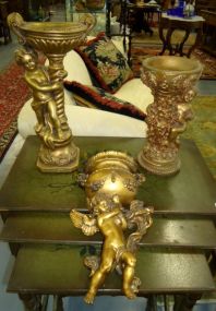 2 Gilt Cherub Floral Stands & a Cherubs Wall Sconce A 17 1/2" Marwal gilt chalkware floral stand, a 13 1/4" weighted resin stand, and a resin 14 1/2"h. wall pocket