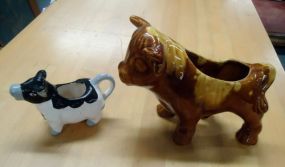 Bull and Cow Brown bull 6 3/4"h, black and white cow 3 3/4"h