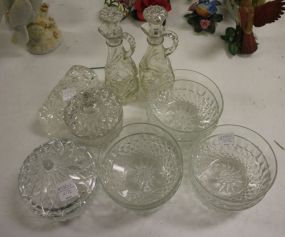 Grouping of Glass Including Six 5" bowls, two small covered dishes 3"dia, pair cruet jars 8"h., butter dish cover.