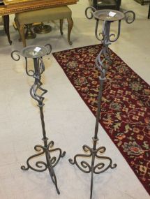 Two Iron Candlesticks 35"., 42"h.