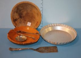 Pans and Utensils Wear ever tin 10" pie pan, Silverplate pie spoon, norge coaster, aluminum tongs, carved wooden bowl 8"dia, Italian wood carved leaf dish 8"w.