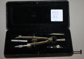 Vintage German Drafting Tool Compass Set in black leather case which is embossed "Lietz German 1665", case is 5" x 2".