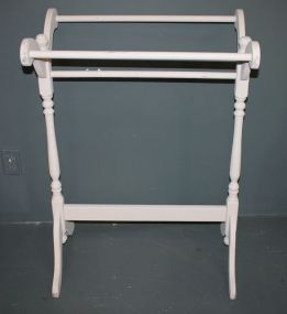 Quilt Rack painted white.