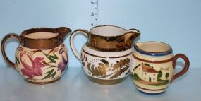 English Creamer "A Rolling Stone Gathers no Moss", a Luster Creamer-Old Foley, England, and a Harvest Ware Wade Pitcher