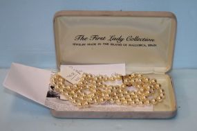 "The First Lady Collection" Three Strand Faux Pearl Necklace