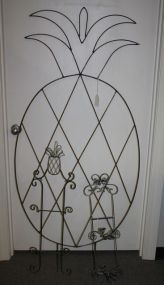 Group of Three Iron Decorative Wall Items and Two Plate Holders