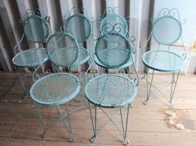 Six Iron Chairs