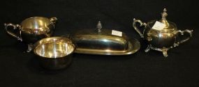 Group of Silverplate Items Four silverplate pieces, sugar, creamer, butter, small bowl (4" dia.)