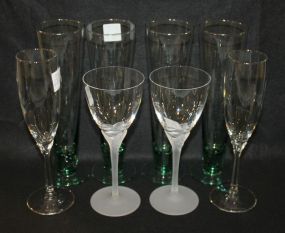 Group of Eight Glasses Set of Four Glasses9 1/2" h., Two glasses w/frosted base 8"h, two champagne glasses 9"h.