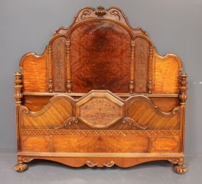 1940's Waterfall Double Size Bed First quarter of the 20th century walnut veneer depression period bed with ornate carving. 54"w., 55 1/2"h.