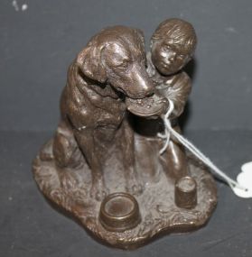 Cold Cast Bronze of Young Boy Feeding His Dog 4"h., 3"w.