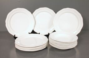 Set of Sixteen Plates and Bowls marked "FF" Description
