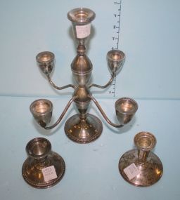 Three Sterling Candlesticks