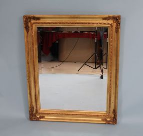 Beveled Glass Mirror With Ornate Corner Frame