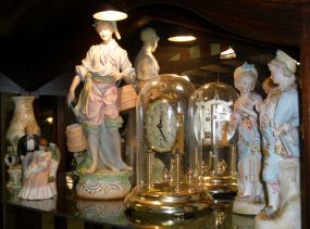 Collection of 18" Figure of Man, Pair of 11 1/2" Figurines Girl and Boy, 8" Girl and Boy, 7" Figurines of Man, Girl and Baby, Clock and Candle Holder