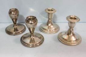 Four Sterling Weighted Candlesticks