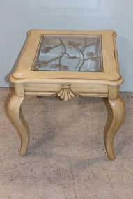 Distressed Cream Colored Side Table with Metal Leaf Design