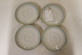 Four Royal Doulton Saucers