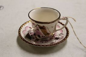 Pink and Gold Cup and Saucer