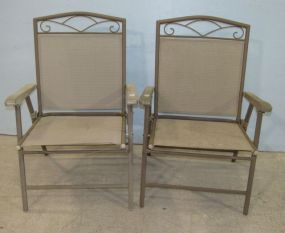 Two Outdoor Folding Chairs