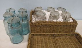 Eleven Mason Jars and basket