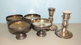 Four Weighted Compotes and Candle Holders