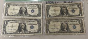 Four 1957 Dollar Blue Seat Notes