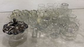 Group of Assorted Glass Table Top Candle Holders, Covered Bowl, and Mini Vases Includes Other Misc Items.